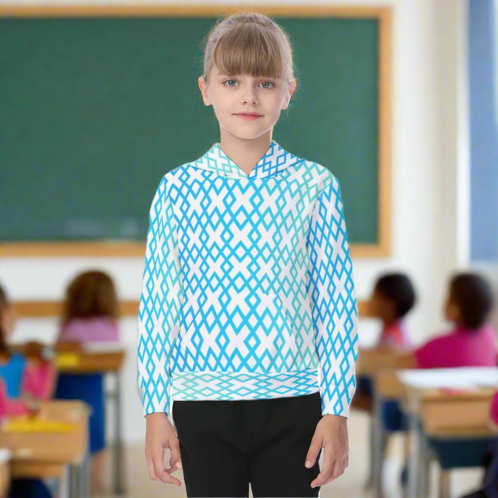 Girl wearing a blue and white patterned hoodie on a white background