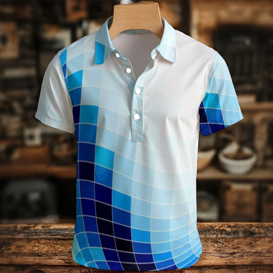 White polo shirt with blue plaid pattern on a wooden mannequin against a blurred indoor background