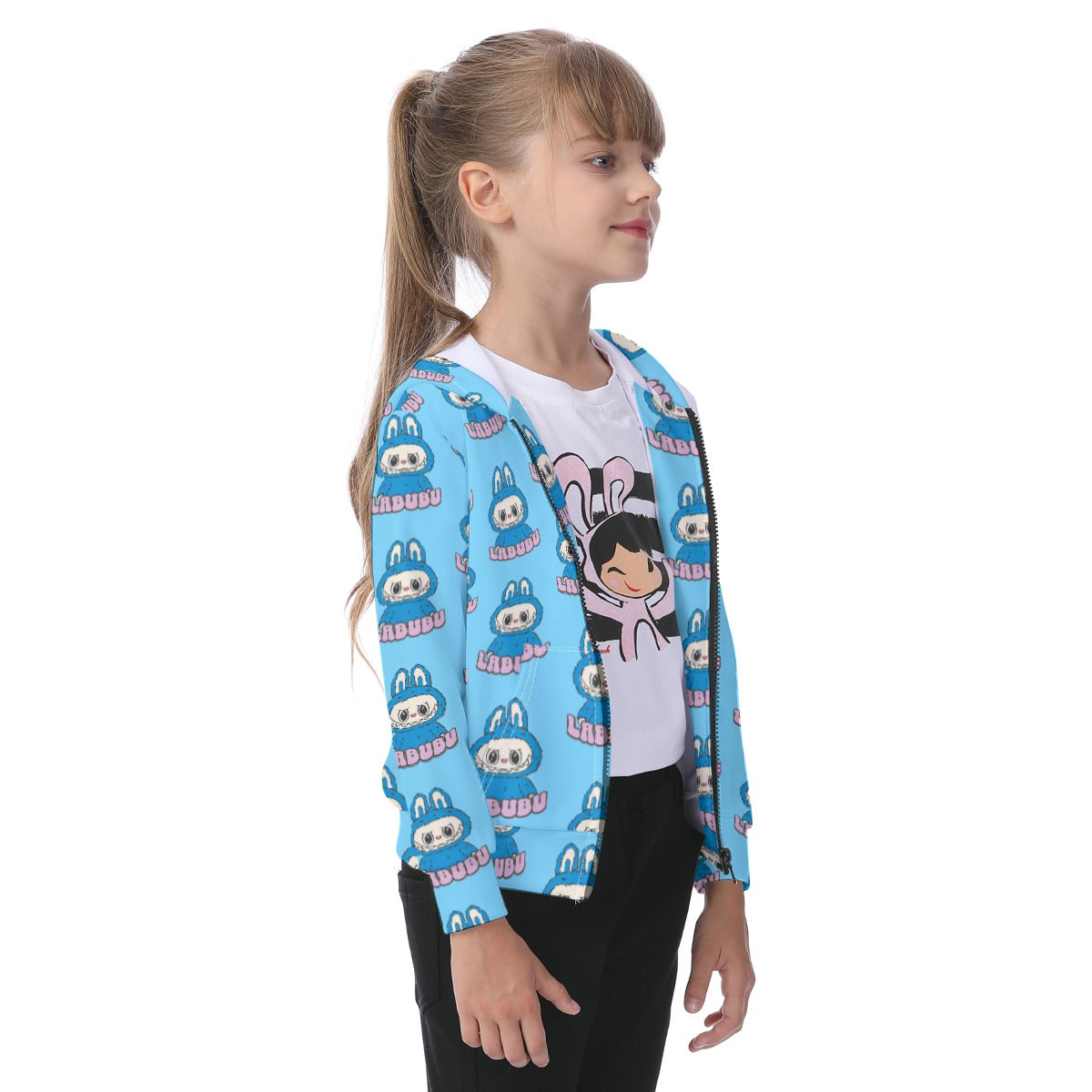Child wearing a blue cartoon-patterned jacket on a white background
