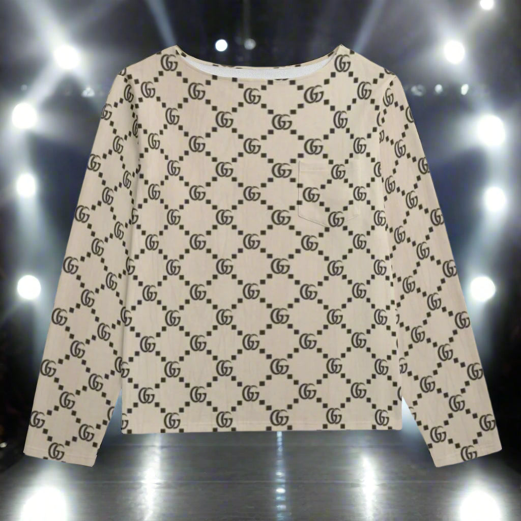 Beige sweater with black pattern on a white background