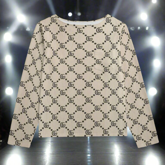 Beige sweater with black pattern on a white background
