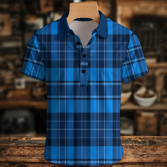 Blue plaid shirt on a wooden hanger with a blurred background