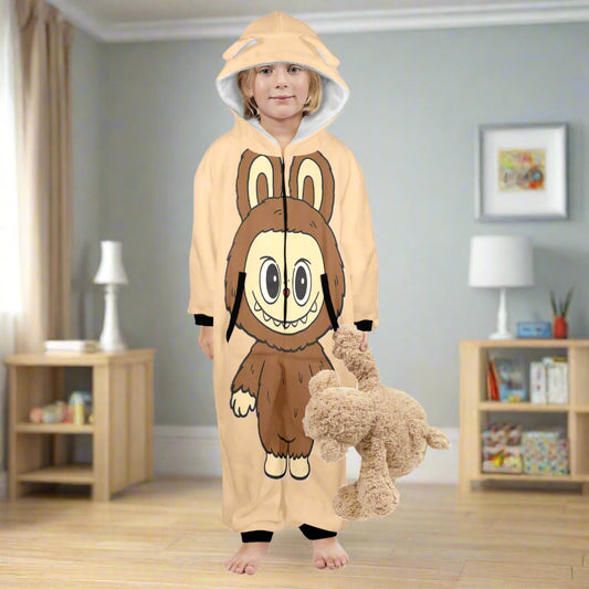 Child wearing a cartoon animal onesie in a room with furniture and decor.