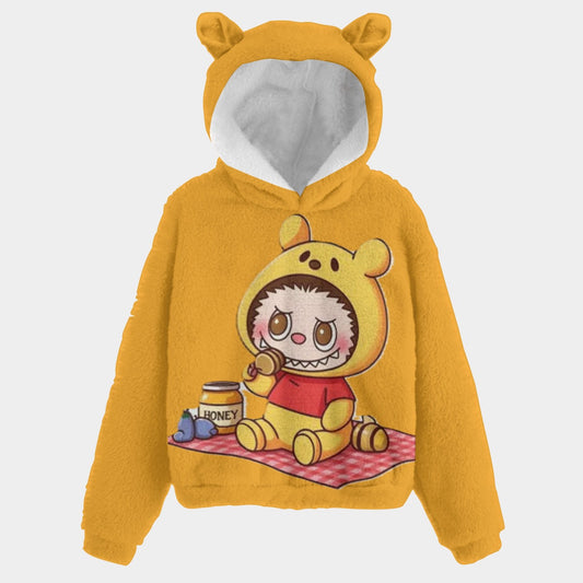 Yellow hoodie with cartoon character design on a white background