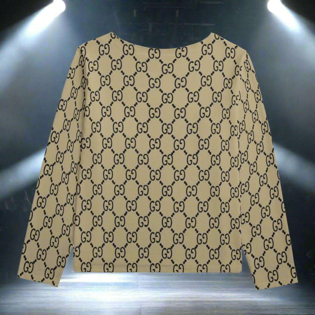 Beige sweater with black pattern on a white background