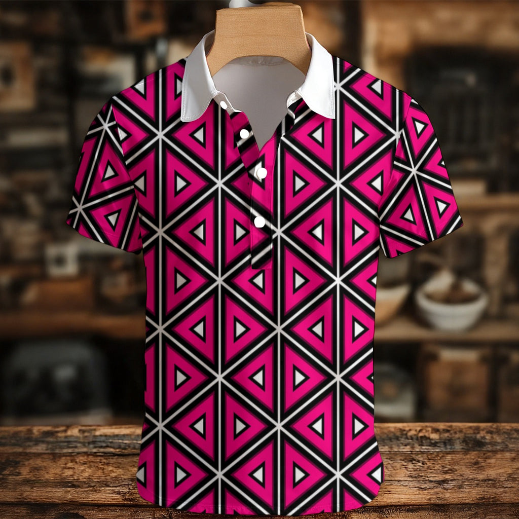 Short-sleeve shirt with pink and black geometric pattern on a wooden surface