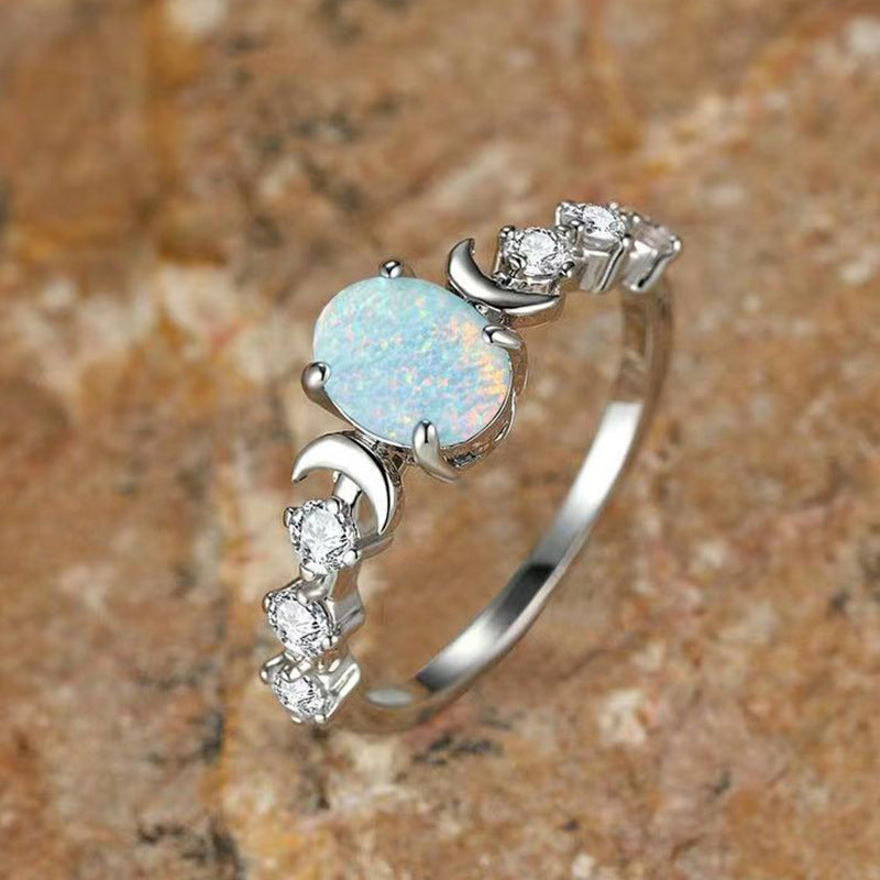 Yun Jin new oval white Aussie treasure moon bright ring retro light luxury four claw style diamond-set hand ornaments