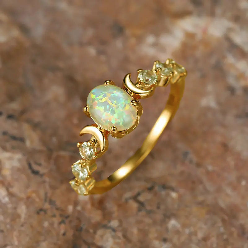 Yun Jin new oval white Aussie treasure moon bright ring retro light luxury four claw style diamond-set hand ornaments