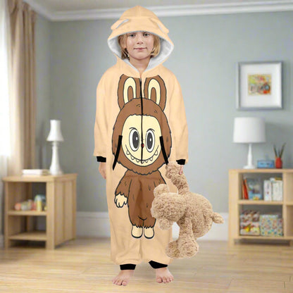 Child wearing a cartoon animal onesie in a room with furniture and decor.