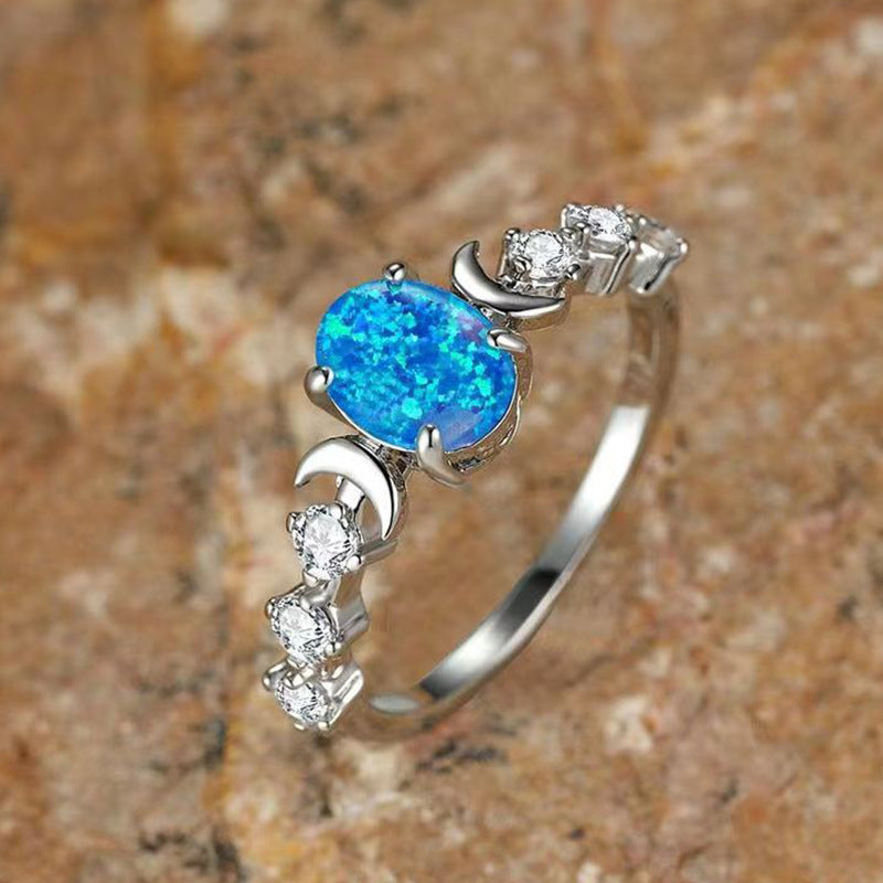 Yun Jin new oval white Aussie treasure moon bright ring retro light luxury four claw style diamond-set hand ornaments